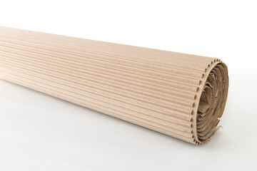 corrugated cardboard rolled up isolated on white background close view