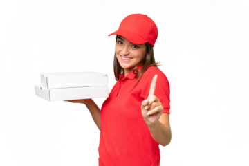 Pizza delivery caucasian woman with work uniform picking up pizza boxes isolated on green chroma background showing and lifting a finger