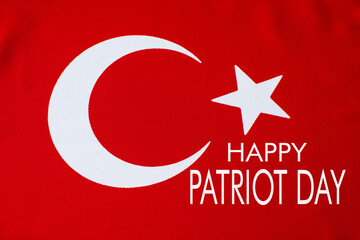 Fototapeta na wymiar Happy Patriot Day is written on the Turkish flag.