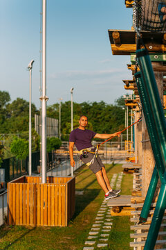 Experienced Trainer Overlooking The Adventure Park