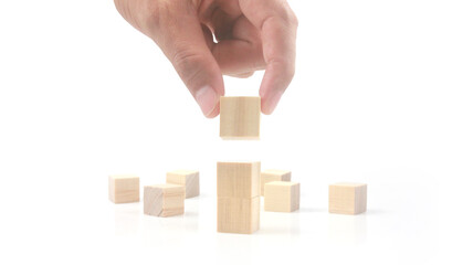 Wooden cubes in hand with copy space for input wording