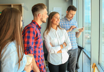 Business team discussing together business plans in office