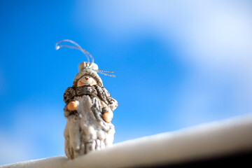 Winter Christmas card, Snowman toy in the snow