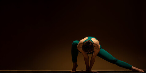 Doing some stretches on the ground while focusing on the breathing