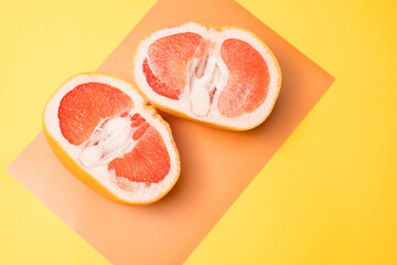 grapefruit banana, woman's hand