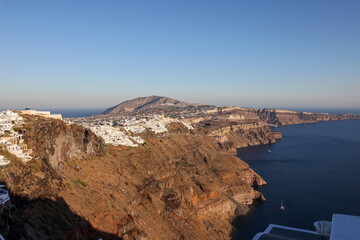 Panoramic view of the Santorini caldera cliffs from the Imerovigli village on Santorini island, Greece