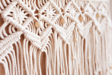 Handmade jute shopping bag with macrame decor. Eco bag for women from Jute and cotton rope. Scandinavian style shopper. Beige tones, sustainable fashion accessories. Zero waste lifestyle.