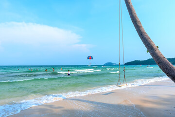 Beautiful tropical beach on the pearl island of Phu Quoc, Vietnam. The beach is clean, clear and blue, with fine sand stretching to attract tourists to have fun at the weekend