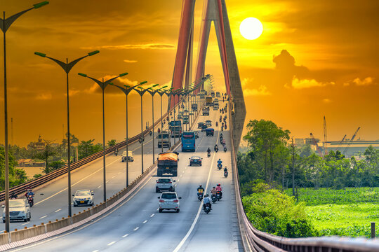Heavy traffic on Can Tho bridge at sunset sky. Can Tho bridge is famous bridge in mekong delta, Vietnam.