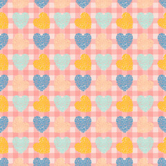Wrapping paper pattern. Heart pattern on plaid pattern.