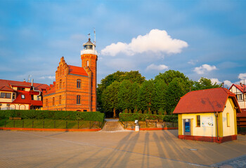 2022-06-02 square in front of baltic sea lighthouse in ustka town on the sunset. ustka, poland