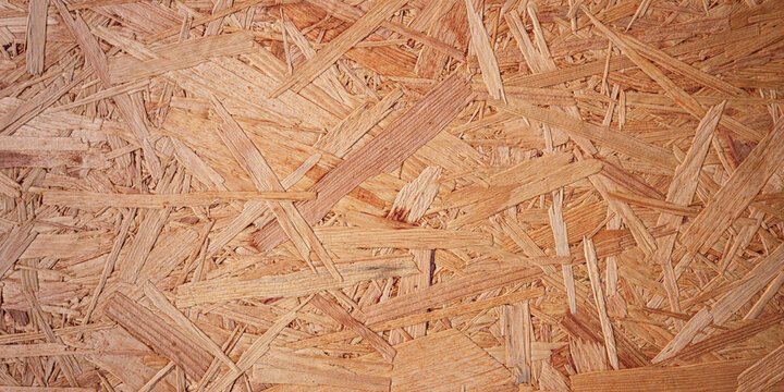 closeup of the surface of a oriented strand board/OSB as a detailed view on the material