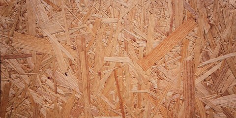 closeup of the surface of a oriented strand board/OSB as a detailed view on the material