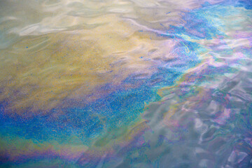 Fototapeta na wymiar Oil spill on sea surface. Pollution in the water.