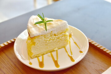slice of cheesecake with cream