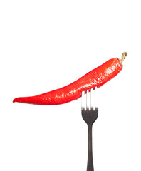 red hot chili peppers on the fork isolated on a white background