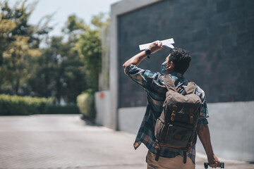 Tourists drag their luggage to check in at the hotel they reserved. Travel concept..