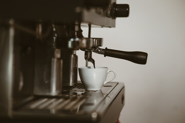 espresso machine in coffee shop counter offering freshly brewed coffee. coffee maker concept.