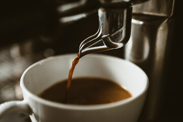 espresso machine in coffee shop counter offering freshly brewed coffee. coffee maker concept.