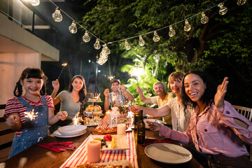 Portrait of big family having fun, enjoy party outdoors in the garden.