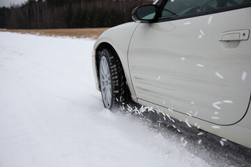 Wheels of a car in motion close up