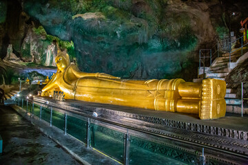 Wat Suwan Khuha temple in the cave with buddha statues, in Phang Nga, Thailand