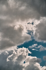 The backdrop of a summer sky before the storm. Natural background with soft clouds.