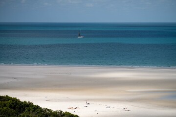 Fototapeta na wymiar tropical island white sand beach on the ocean