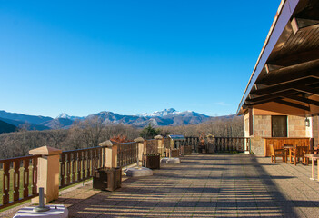 wooden terrace with mountain views