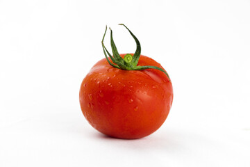 Red tomato on white background