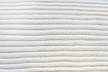 White knitted texture of woolen wool