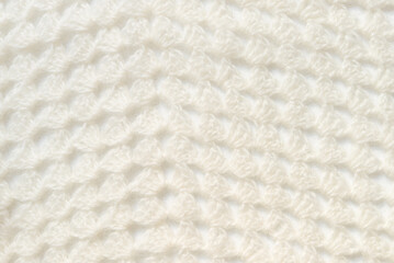 White knitted texture of woolen wool
