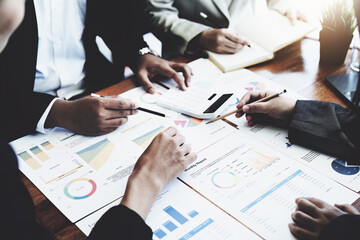 The company's businessmen meet and discuss to plan a marketing strategy and come to a conclusion on how to use the financial budget to avoid investment risks