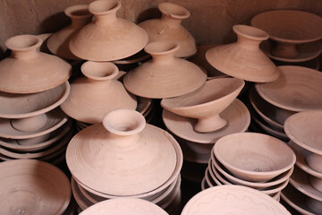 Ceramic bowls and containers without painting, only with the mud clay