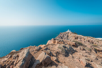 Fototapeta na wymiar Akrotiri Lighthouse in Santorini, Greece.