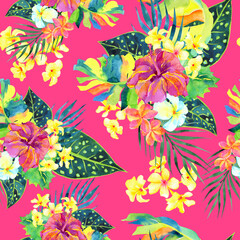 Colorful tropical flowers and leaves on a pink background. Seamless floral watercolor pattern