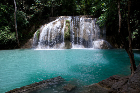 Erawan Waterfall in Kanchanaburi. Amazing turquoise water and wonderful jungle. Ideal place for a picnic and relaxation. One of the most famous tourist attractions in Kanchanaburi province, Thailand. © Ewelina Thepphaboot