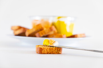 Slice of bread with fresh hummus dip