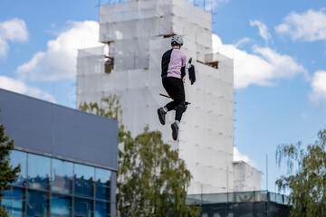 Rider at the Scooter Pak competition. Extreme sport. © Serhii