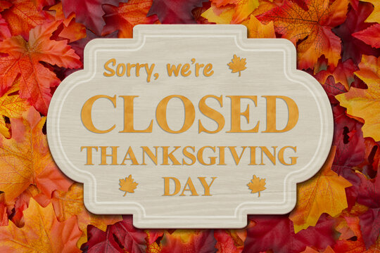 Closed Thanksgiving Day Sign With Fall Leaves