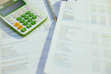 tax time. calculator and documents on table