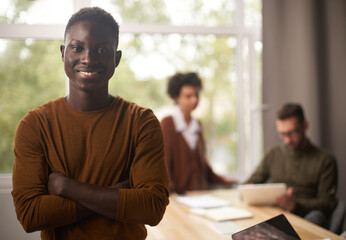 Portrait of a young African American business man in office © ASDF