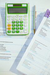 tax time. calculator and documents on desk