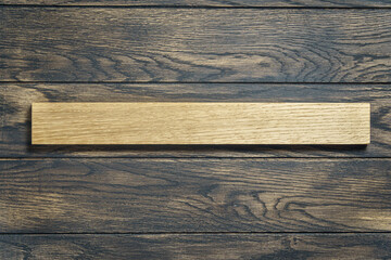 Oak plank on an oak table top view. DIY concept background