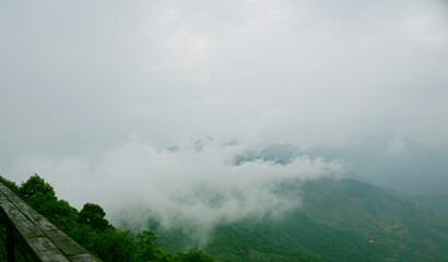 Clouds floating over mountains and dreamy sky of                              Ta Xua, Vietnam
