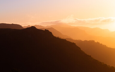 Sunrise view of mountain layers.