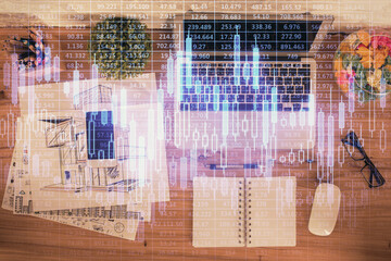 Multi exposure of financial chart drawing over table background with computer. Concept of research. Top view.