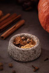 Preparing homemade pumpkin spice from scratch