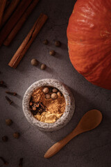 Preparing homemade pumpkin spice from scratch