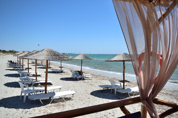 beach chairs and umbrellas